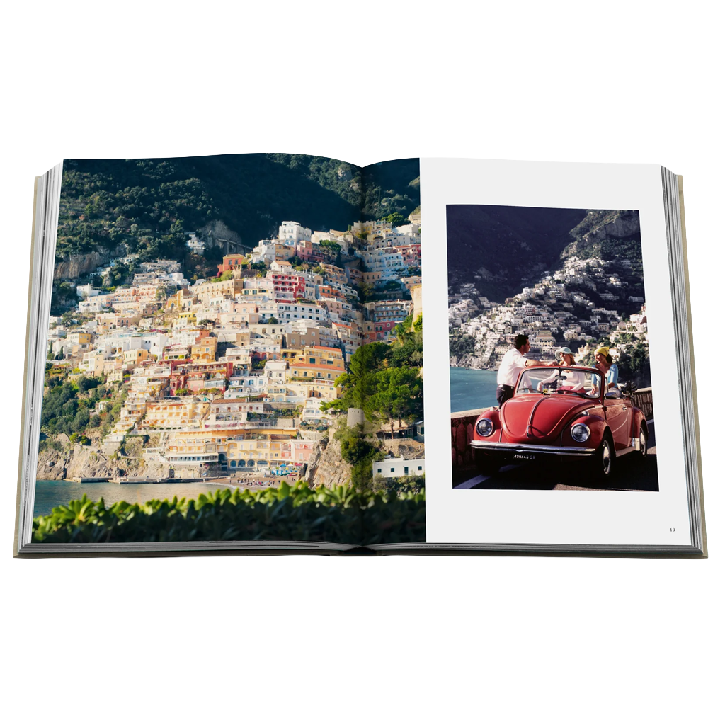 A photo of an open coffee table book with colorful Italian images on a white background