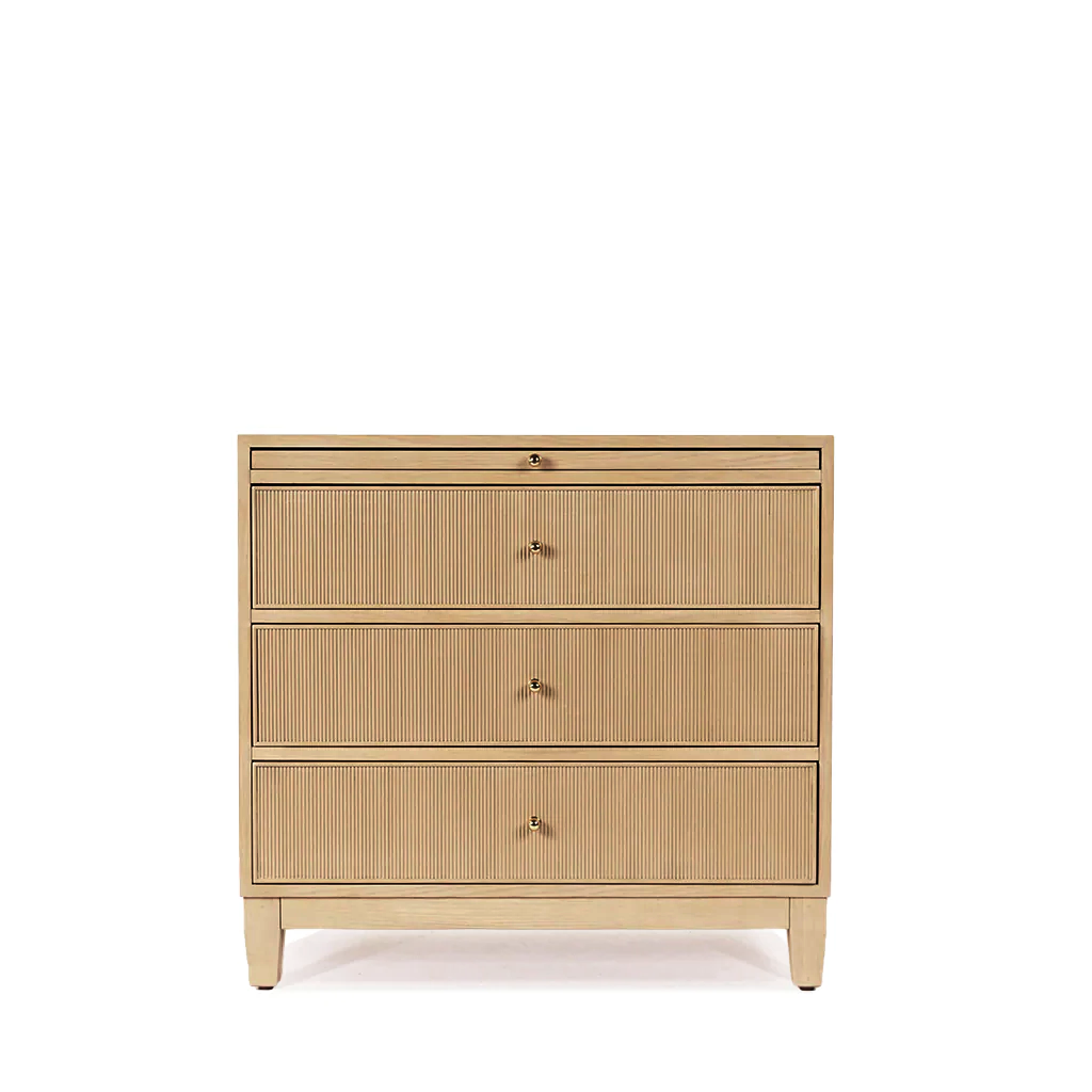 Beige dresser with three drawers on a white background