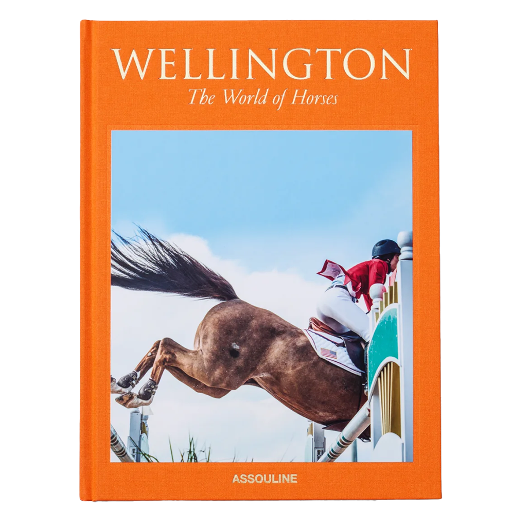 Book titled 'Wellington: The World of Horses' with an orange cover featuring a horse and jockey on a jump.