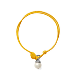 A yellow braided cord bracelet with a decorative knot and a hanging white pearl pendant on a silver cap, shown against a plain white background.