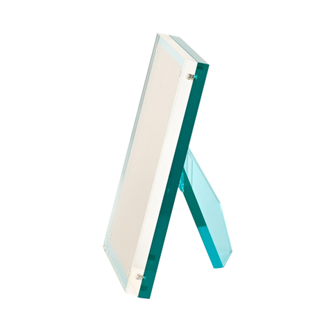 Image of a turquoise lucite frame at an angle 