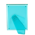 Image of the back of a turquoise lucite frame