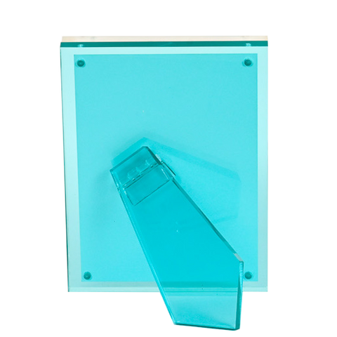 Image of the back of a turquoise lucite frame