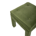 green upholstered bench