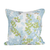pillow with green and blue leaf motif
