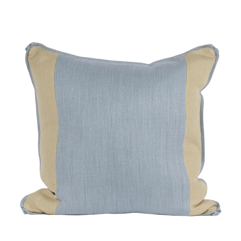 blue and neutral toned color block pillow