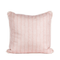 pink pillow with white floral fern motif