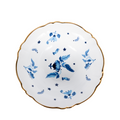 interior of white porcelain salad bowl with blue floral details and gold rim