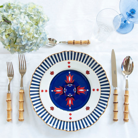 Modern Geometric Dinner Plate in Blue styled with dessert plate, flatware and glassware on top of the tablecloth