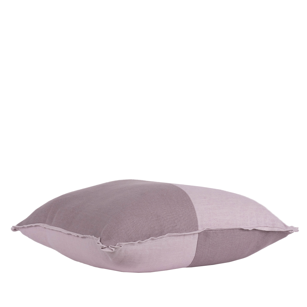 image of lavender and plum harlequin pillow from side