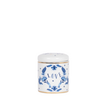 porcelain candle with blue motifs and the word "love"