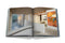 Art House Book open featuring photograph of a contemporary home with artwork