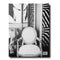 The back cover of the Big Book of Chic featuring black and white photograph of a room and a chair