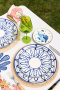 Blue Gojun Small Plate on tablecloth next to tabletop setting