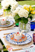 Juliska Puro Whitewash Ramekin on top of plates, on outdoor table setting