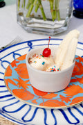 Juliska Puro Whitewash Ramekin with ice cream, sprinkles, and a cherry on plate