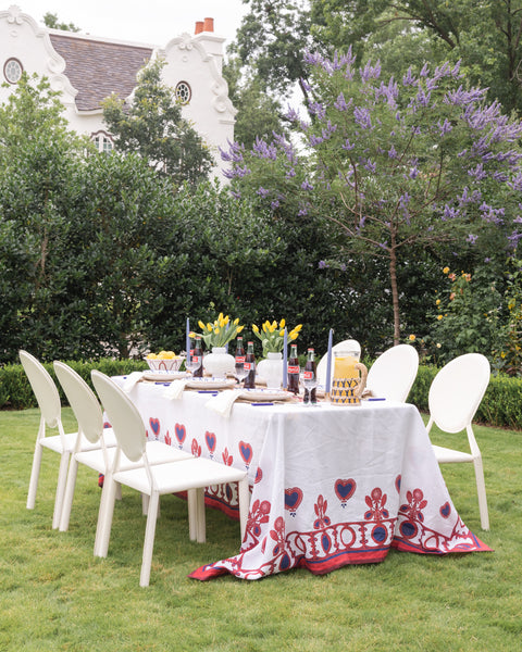 LaDoubleJ Heart Tablecloth on dining table in outside courtyard with full tablescape set up