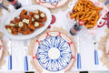 Juliska Quotidien White Truffle Large Oval Platter styled on red, white, and blue tablescape