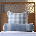 Blue Floral Trimmed Bolster styled on twin bed with Sky Check Euro
