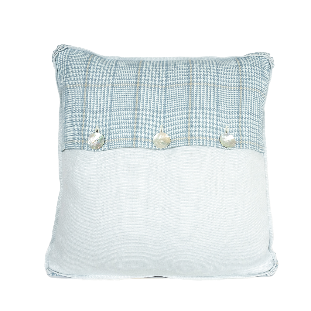 Back of Pillow. Top half same print as front. Bottom half light blue. 3 mother of pearl buttons