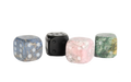 Andean stone dice, set of four, showing one of each color: blue, onyx, pink, and green