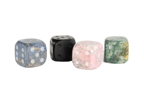 Andean stone dice, set of four, showing one of each color: blue, onyx, pink, and green