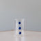 Three Tiered Blue Embellishment Tumbler on table