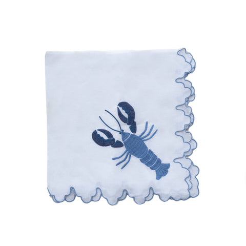 blue embroidered lobster on white napkin
