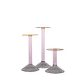 three colored glass candleholders