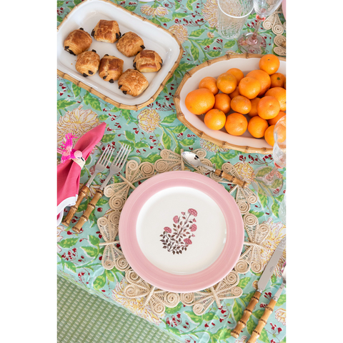 Lampyrid Placemat with dinner plate, flatware and napkin on top of tablecloth