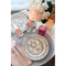 Olivia Dot Placemat in Rain paired with dinner plate, glassware, napkin, and flatware