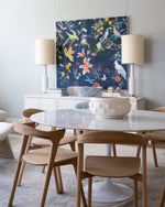 marble table with brown wood chairs surrounding it