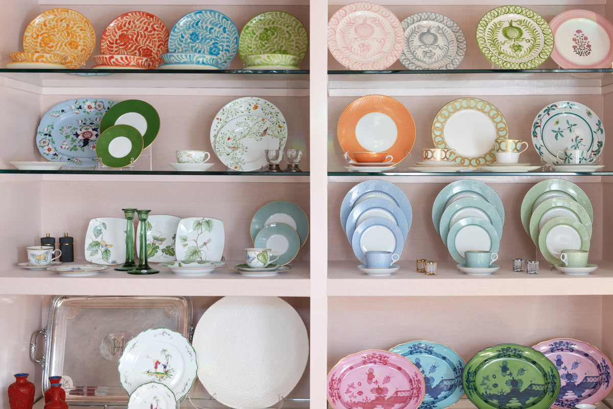 Mottahedeh Lace Dinner Plate in Green Apple displayed on wall of china