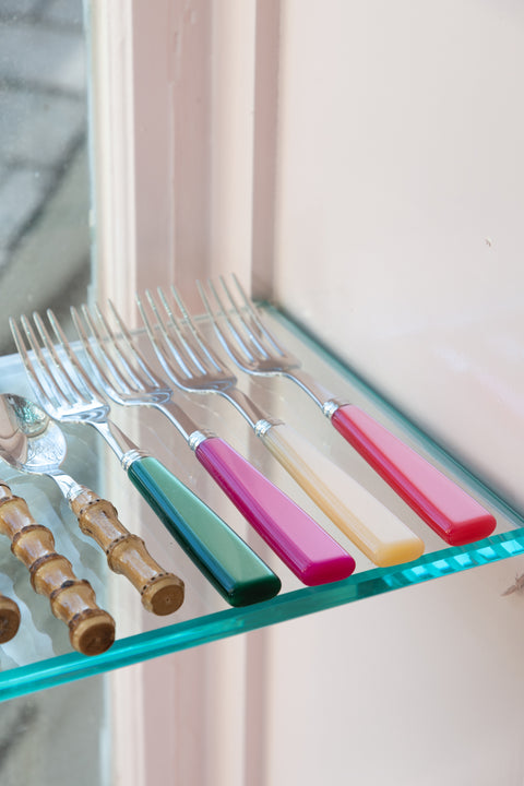 Sabre Paris Icone Flatware in Candy displayed with other color options
