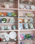 Mottahedeh Cornflower Lace Bread and Butter Plate displayed on shelves