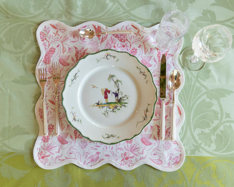 Raynaud Longjiang Dinner Plate styled with placemat, flatware and glassware on top of tablecloth