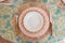 Juliska Classic Bamboo Natural Cocktail Plate paired with dinner plate on top of placemat with flatware