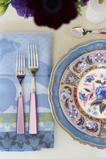 Sabre Paris Icone Flatware in Lilac on top of napkin