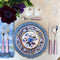 Royal Crown Derby Imari Accent Plate Blue Camelias displayed with dinner plate, flatware and glassware on top of tablecloth