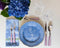 Richard Ginori Pervinca Dinner Plate styled with flatware, glassware and napkin