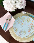 Raynaud Paradis Turquoise Dinner Plate styled with placemat, napkin and flatware