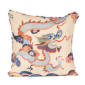 Cream pillow with blue and red dragon design. Frontside of pillow