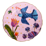 round platter that is pink with bird and floral pattern