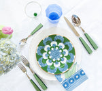 Aerial view of Vietri Lastra White European Dinner Plate with accent plate, flatware, napkin and glassware displayed on top of tablecloth