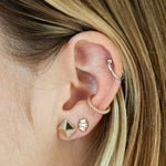 Triple Diamond Studs on model's ear