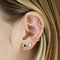 Triple Diamond Studs on model's ear