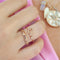 Model wearing Love Ring in Rose Gold