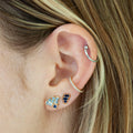 Model wearing Blue Mix Studs with various earrings