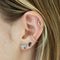Stacked Sapphire Studs, on model with other studs