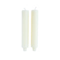 two off-white column taper candles 